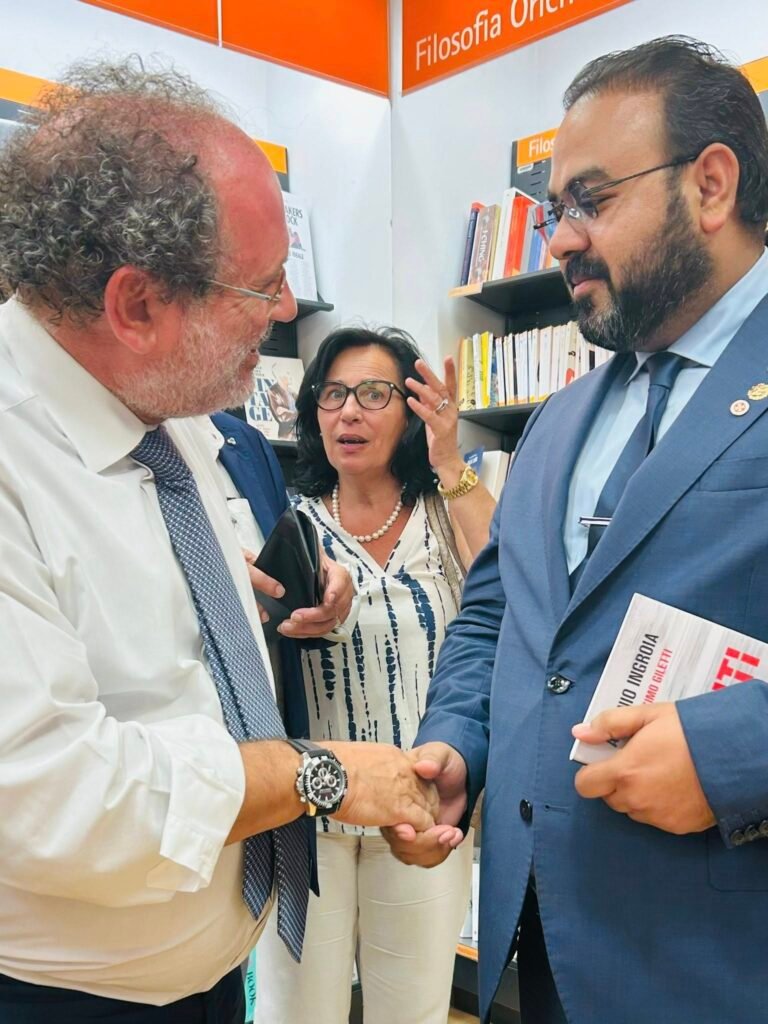 Dr. Waqas Nadeem, President of Human Trust International, with former anti-mafia judge Antonio Ingroia in Italy, discussing global justice, human rights, and women’s protection initiatives.