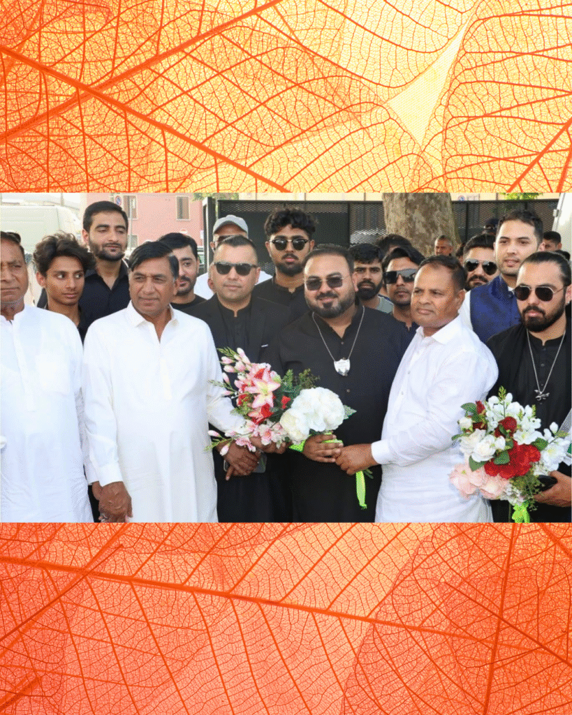 "Group photo of Pakistan Sports Club Brescia organizers and guests during the 21st Annual Pakistan Sports Festival in Brescia, Italy — featuring Dr. Muhammad Waqas, Malik Muhammad Saleem, Malik Abdul Rahman, and community leaders welcoming guests with floral bouquets."